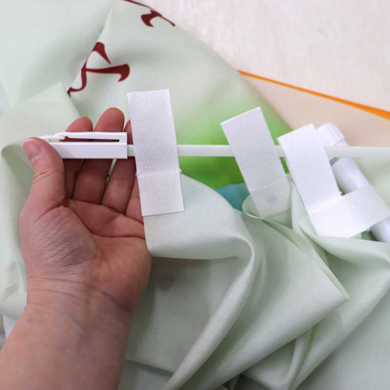 （３）横棒に上部のチチを通す