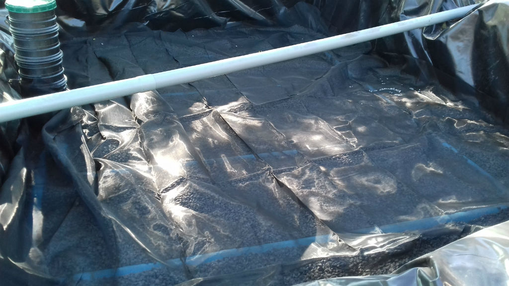 4/6 Pose d'un géotextile avec sable roulé lavé  0/4