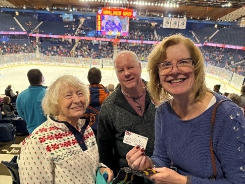 PSC Business Card posed at the Wolves Game with Sandi S, Kevin C and Sandy L