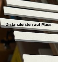 Custom-made spacer strips made of museum board