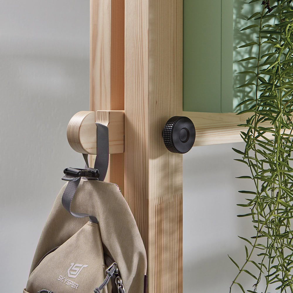 A coat hook can be attached to the side using a clamp fitting and knurled thumb screw.