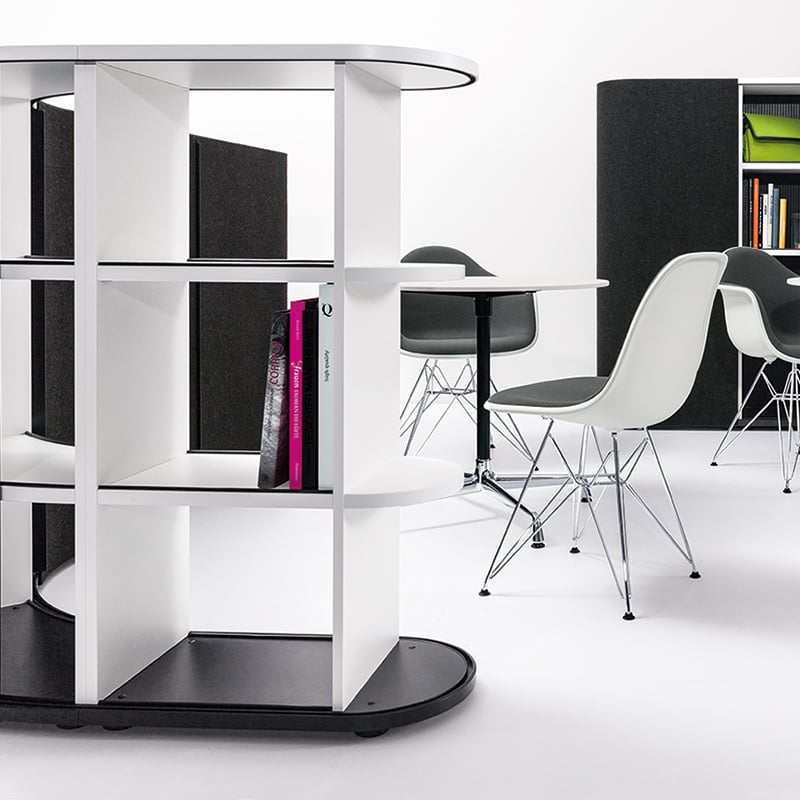 Open shelf structures can be partially closed off with felt "slider" blinds.