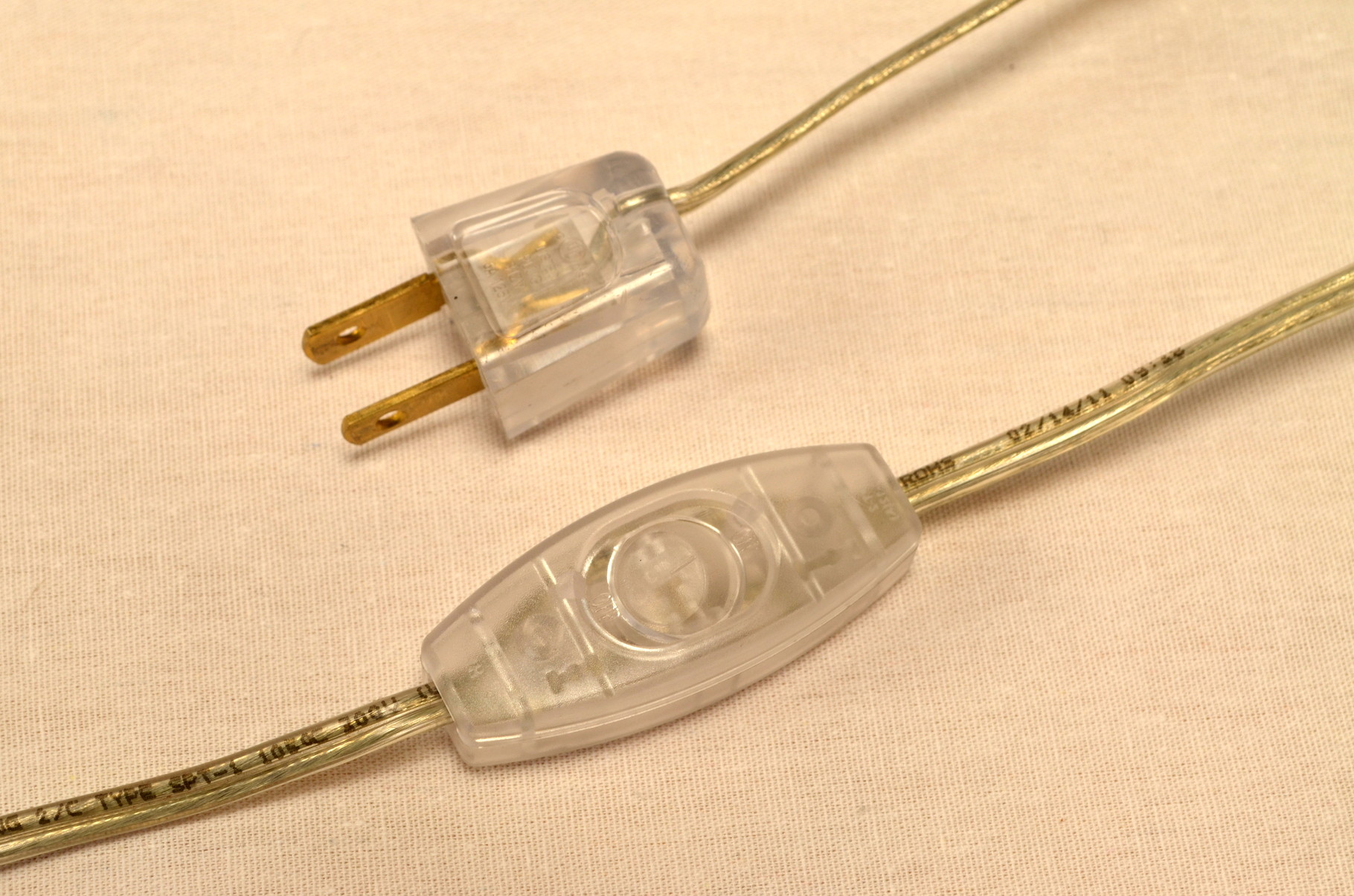 He's wired with an 8 foot heavy duty clear electrical cord with contemporary clear plug and inline switch.