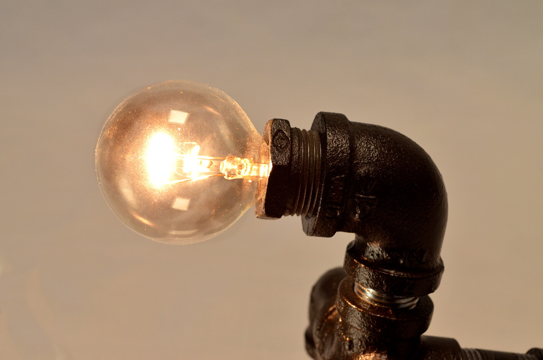 Guerrillamp's head is a mellow 25 watt bulb.