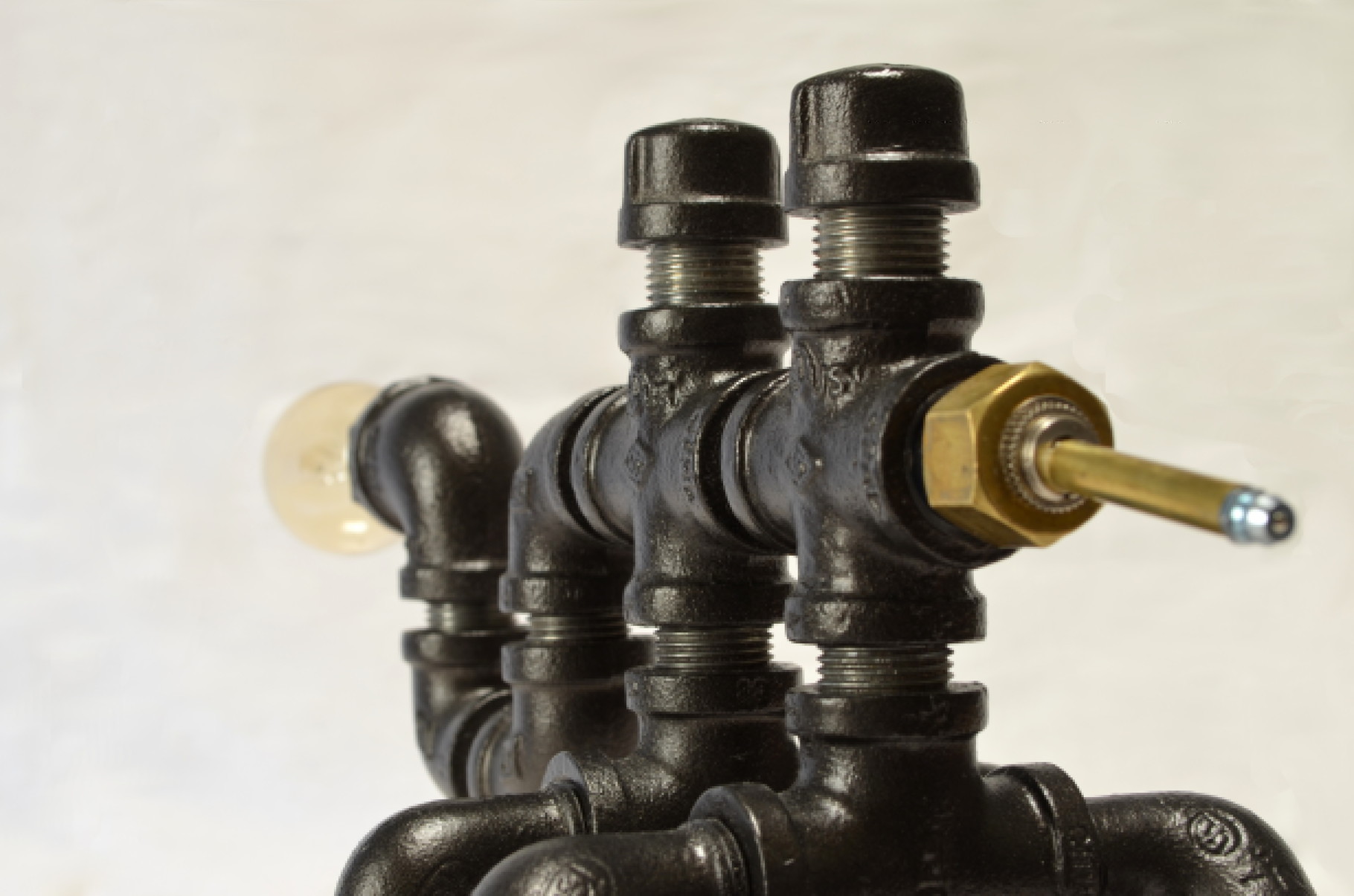 Camelamp in deep oil-rubbed bronze exudes an almost locomotive-like power.