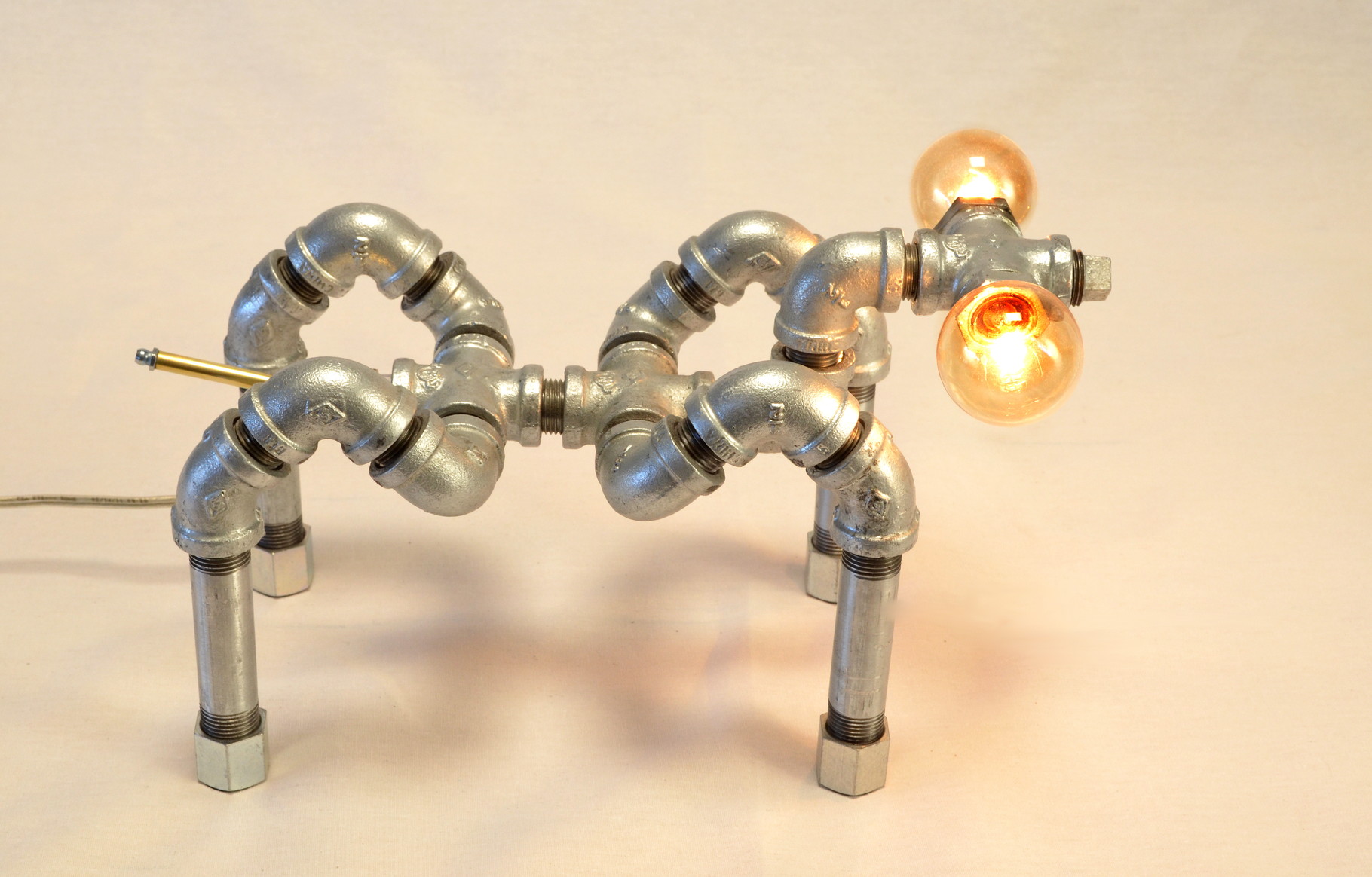 Sprite from slightly above, showing his bilateral, balanced metal form.