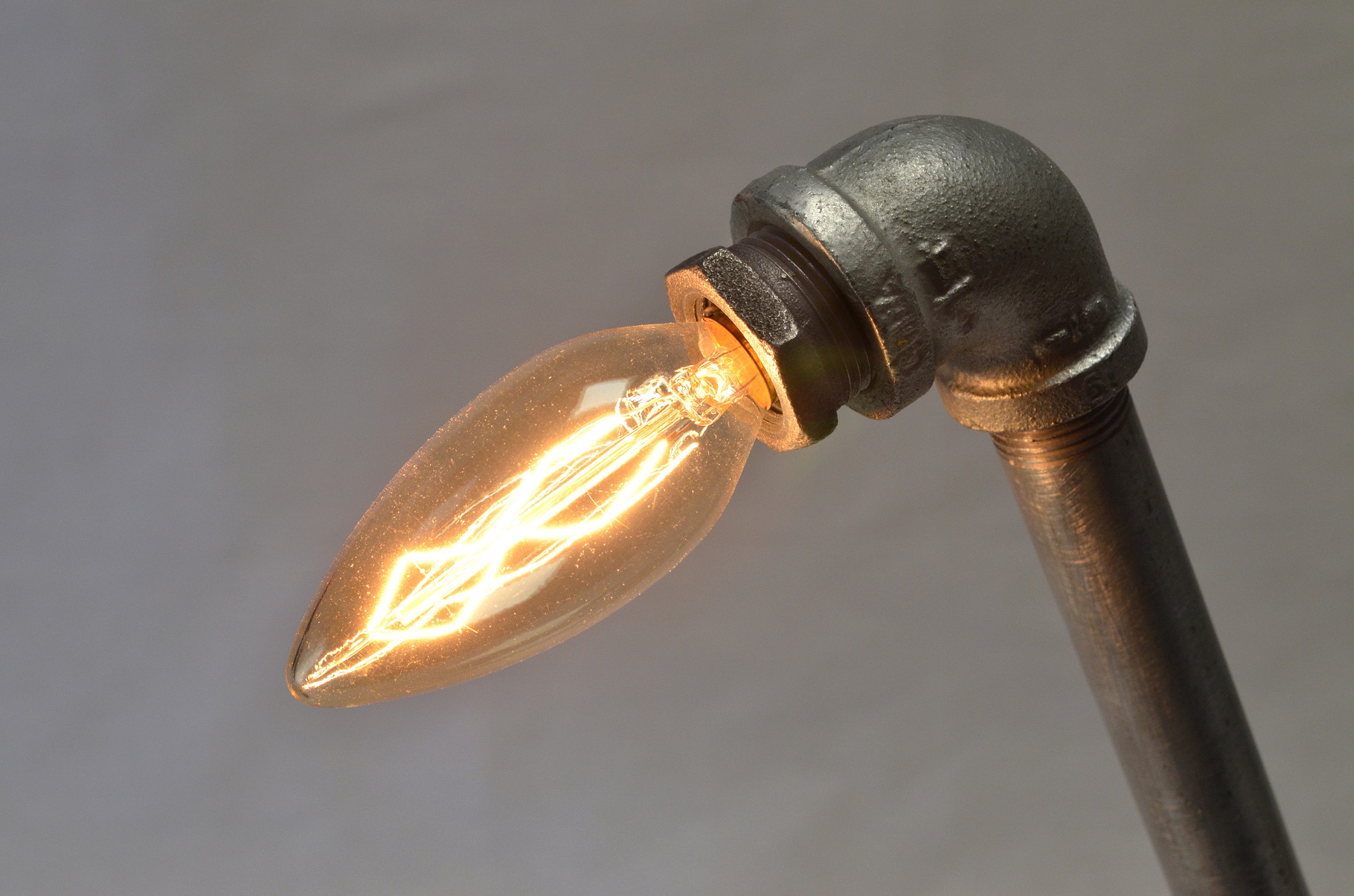 A closeup of Giro's candelabra, decorative chandelier bulb head.