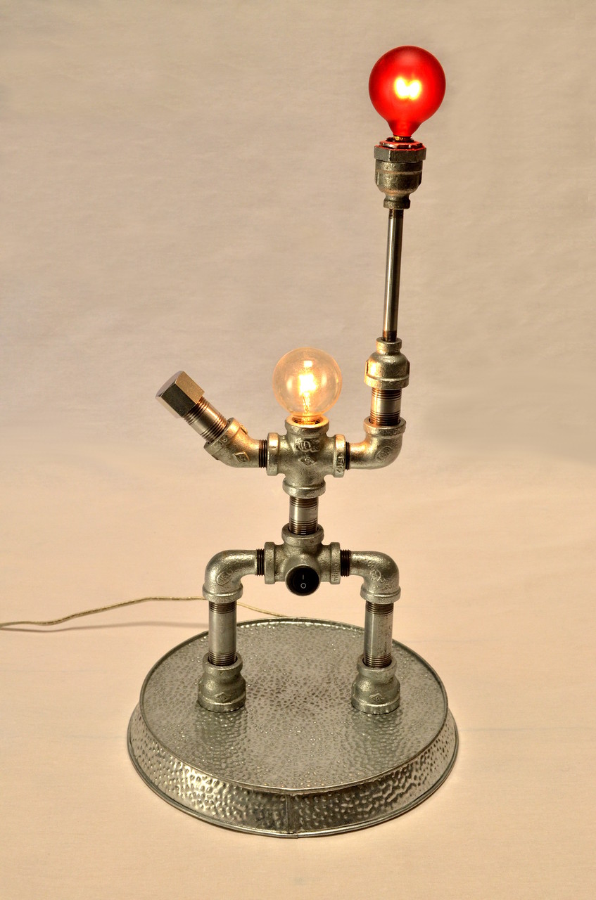 Note Bloon's 10-1/2" diameter pebbled galvanized base that keeps him firmly planted.