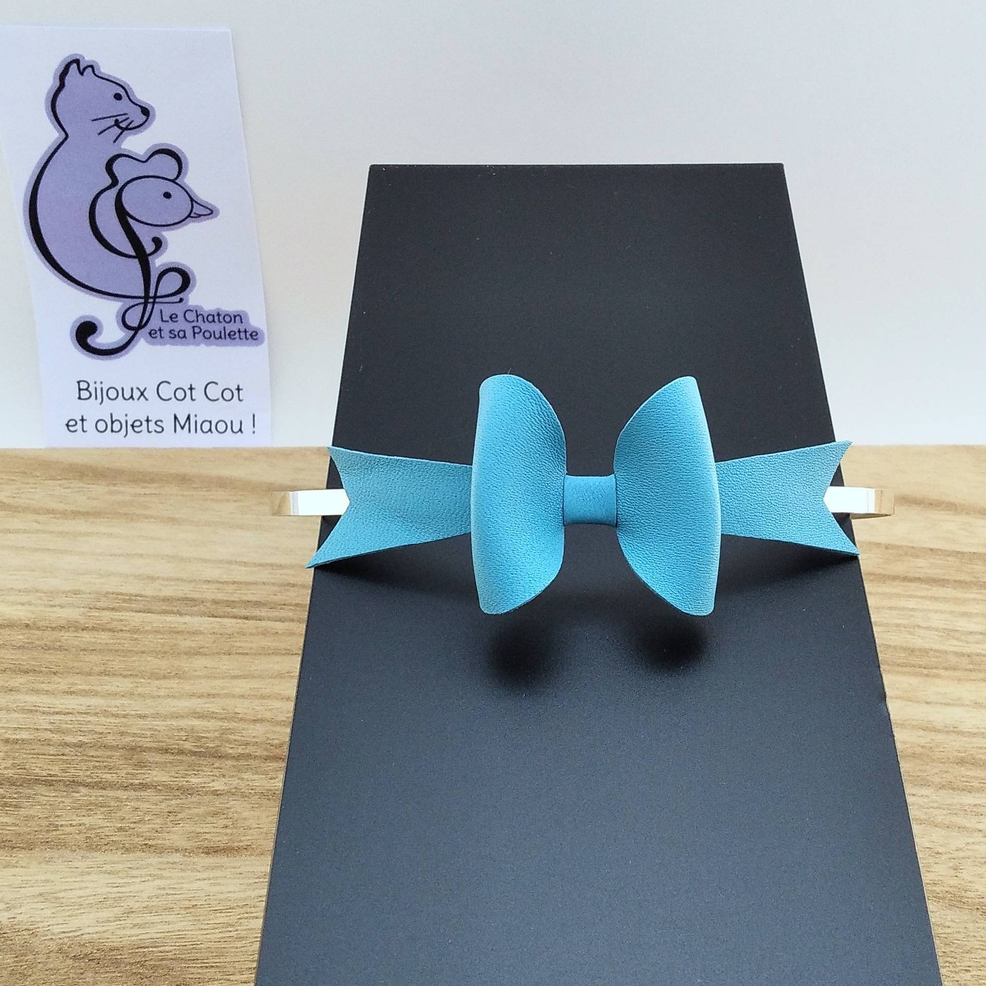 Serre-tête nœud en cuir bleu azur