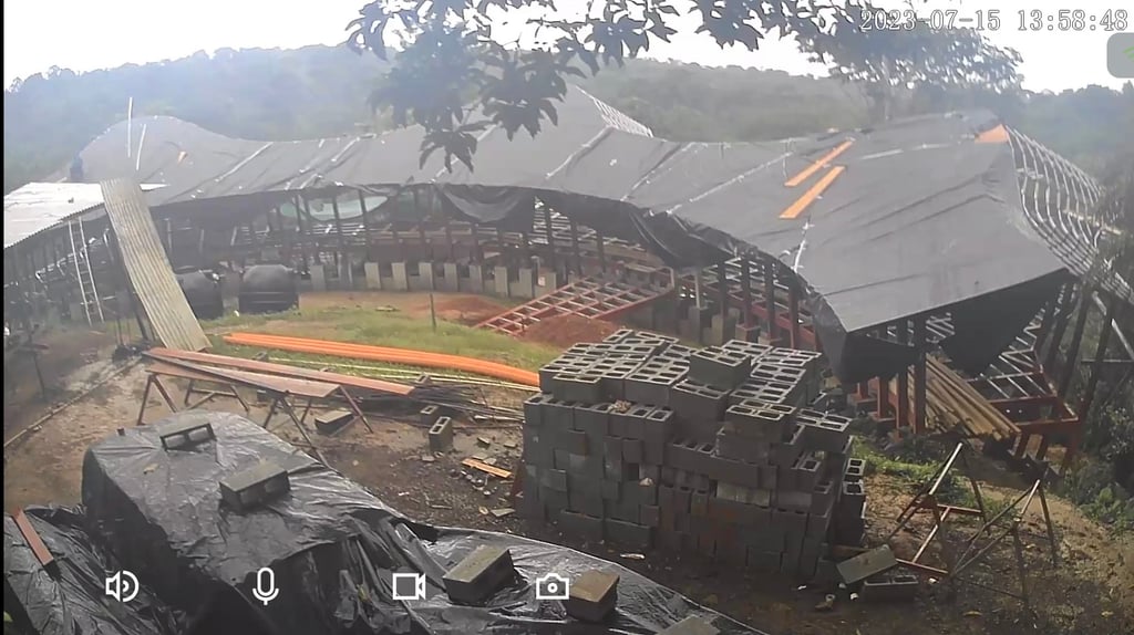 July 2023 - rainy season started; its a fight to keep the first layer of the roof dry. Our weekend guard has to cover the roof again after a gust of wind (see far left side on the roof)