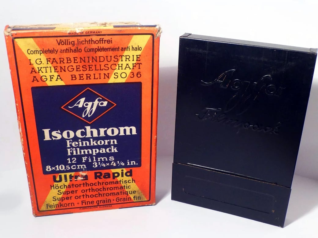Agfa 1930s Isochrom film as advertised on the sign with Liang Saizhu. From the MOFBA collection.