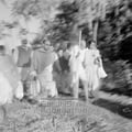 Mahatma Gandhi on his peace march in Noakhali (West Bengal), c. November 1946; center: Gandhi's secretary Pyarelal Nayer, right: Abha Gandhi.