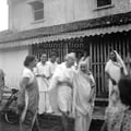 Mahatma Gandhi leaning on Jankidevi Bajaj, the mother of Jamnalal Bajaj, at Magan Wadi, Wardha, c. 1945.