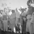 Mahatma Gandhi  with associates during peace march in Noakhali, c. November 1946.