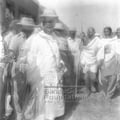 Mahatma Gandhi at a train station in Noakhali, 1946; right: Gandhi's granddaughter Manu Gandhi, c. March 1947.