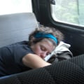 Maria asleep in the back seat