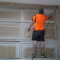 Professional spray painting of shop front window frames in Balmain by Alpha Coatings