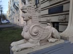 White stone sculpture of a sphinx in Riga's Art Nouveau district