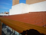 Cerramiento terraza con panel teja en Zaragoza