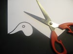Cut out head with scissors.