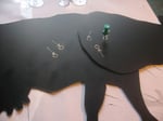Make holes with push pin for joints and for restricting string (restricting string enables cow's head to move up and down but not too far either way) it is made of nylon fishing line.