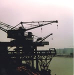 Drei Krans der SPEDAD im St.Johann-Hafen in der Abendsonne, 1974