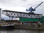 Neuer Kran auf alter Kranbahn von «Thommen-Eisenschrott und Recycling», 2010,  (früher Reederei Oberrhein Kohlenumschlag) 