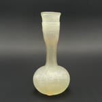 Flasche mit etwas gedrückter Kugelform, mit langem. röhrenförmigem Hals, aus schwach gelb- grünlichem Glas.   4.-5. Jh.n.Chr.   Fundort: unbekannt.  K.F. 737, Inv BAV 141  Höhe ca 150 mm  Gefäß Nr. 303