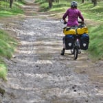 Fünf Kilometer schieben und zerren durch den Sand auf dem R10 nach der Grenze . . .