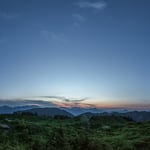 Sonnenuntergang am Gipfelkreuz Walleralm
