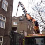 Bouwmateriaal naar boven