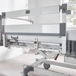 Normschiene mit Aufnahme für Fixiergurte