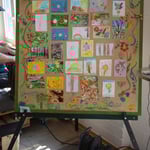 Pinnwand mit Zeichnungen und Fotos der NABU Kids