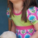 Art.TU5 Jerseytunika "Blumenmedaillon" Gr.  92/98  59.-