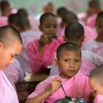 Novices eating at the women's section of the Kalaywa Monastery in Yangon     © Stephan Stamm