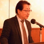 2022年予測を話す菊地トオル学長