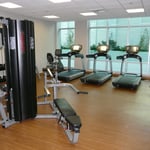 Cosmopolitan Building, Interior Work: Gypsum Board Walls, Ceilings, Facias, ACT Ceilings, Metal Cladding, Vinyl Flooring, Wood Finish, Architectural Ceilings