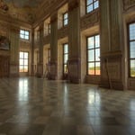 Den durch zwei Stockwerke aufragenden Festsaal plante der kaiserliche Architekt Johann Bernhard Fischer von Erlach