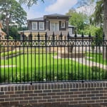 professional electrostatic spray painting of fences for a residence in Parramatta by Alpha Coatings