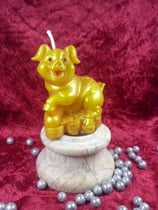 Bienenwachs-Kerze goldfarbenes Glücksschweinchen. 4,5x6x7,5cm