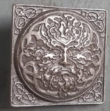 Green man argent