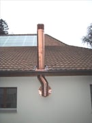 Abgasanlage von Cheminéeofen an Fassade Fisa AG, Kaminbau