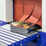 容器ごとフィルムで覆うシュリンク包装機