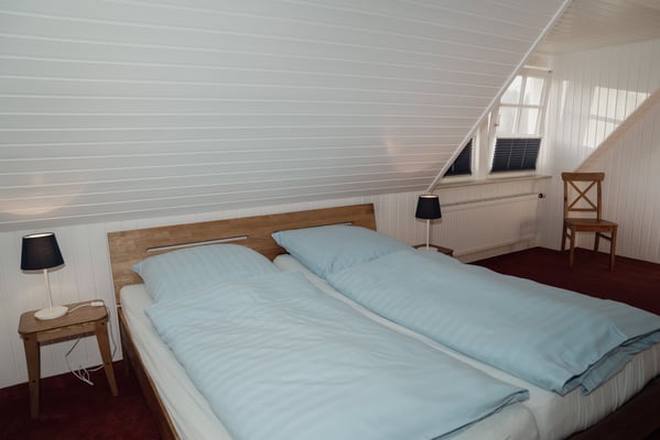 Das zweite der drei Schlafzimmer in Wohnung 6.