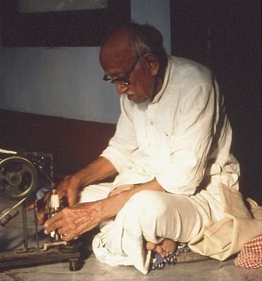 Prabhudas Gandhi spinning on Amber Charkha at Kasturba Ashram near Rajkot, January 1, 1988.