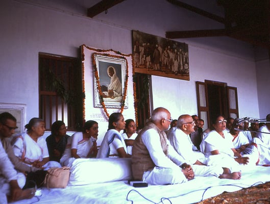 Prabhudas Gandhi with Amrutbhai Modi (centre) and Abhaben Gandhi (right) during the prayer on the occassion of Mahatma Gandhi's 42nd death anniversary at Sabarmati Ashram, Ahmedabad, January 30, 1990.