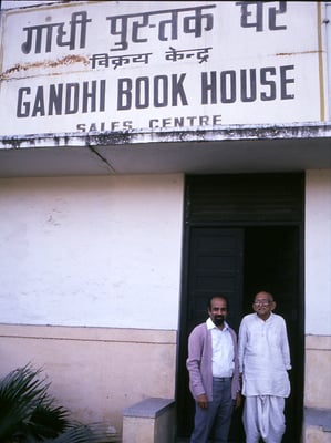 N. Vasudevan (manager Gandhi Book House) and Prabhudas Gandhi  in front of the Gandhi Book House, New Delhi, January 26, 1988.