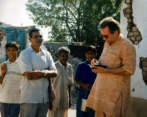 Peter Rühe and sarvodaya workers talking to surviving locals after the Gujarat Earthquake, 2001