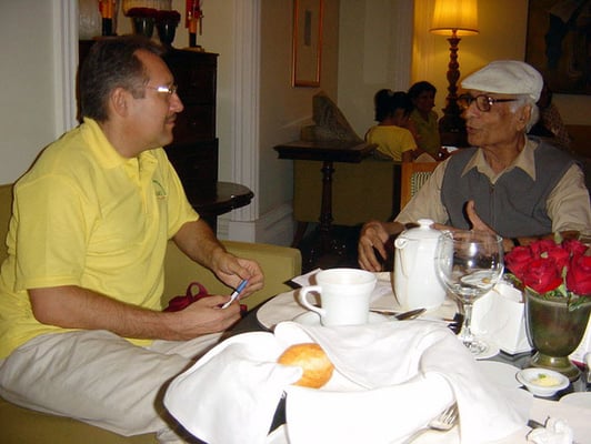 Peter Rühe talking with oral historian and journalist, Hiro Shroff, at Mumbai, 2005