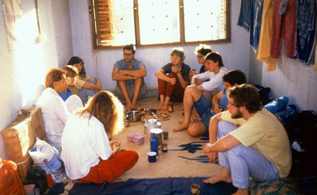 Peter Rühe (left) leads a group tour “In the Footsteps of Mahatma Gandhi” through Gujarat, Mumbai, 1987